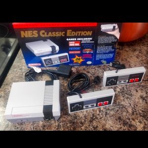 Authentic Nintendo NES mini with box and extra controller!